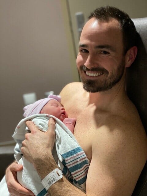 Alex of Pursuing Fatherhood with his newborn baby