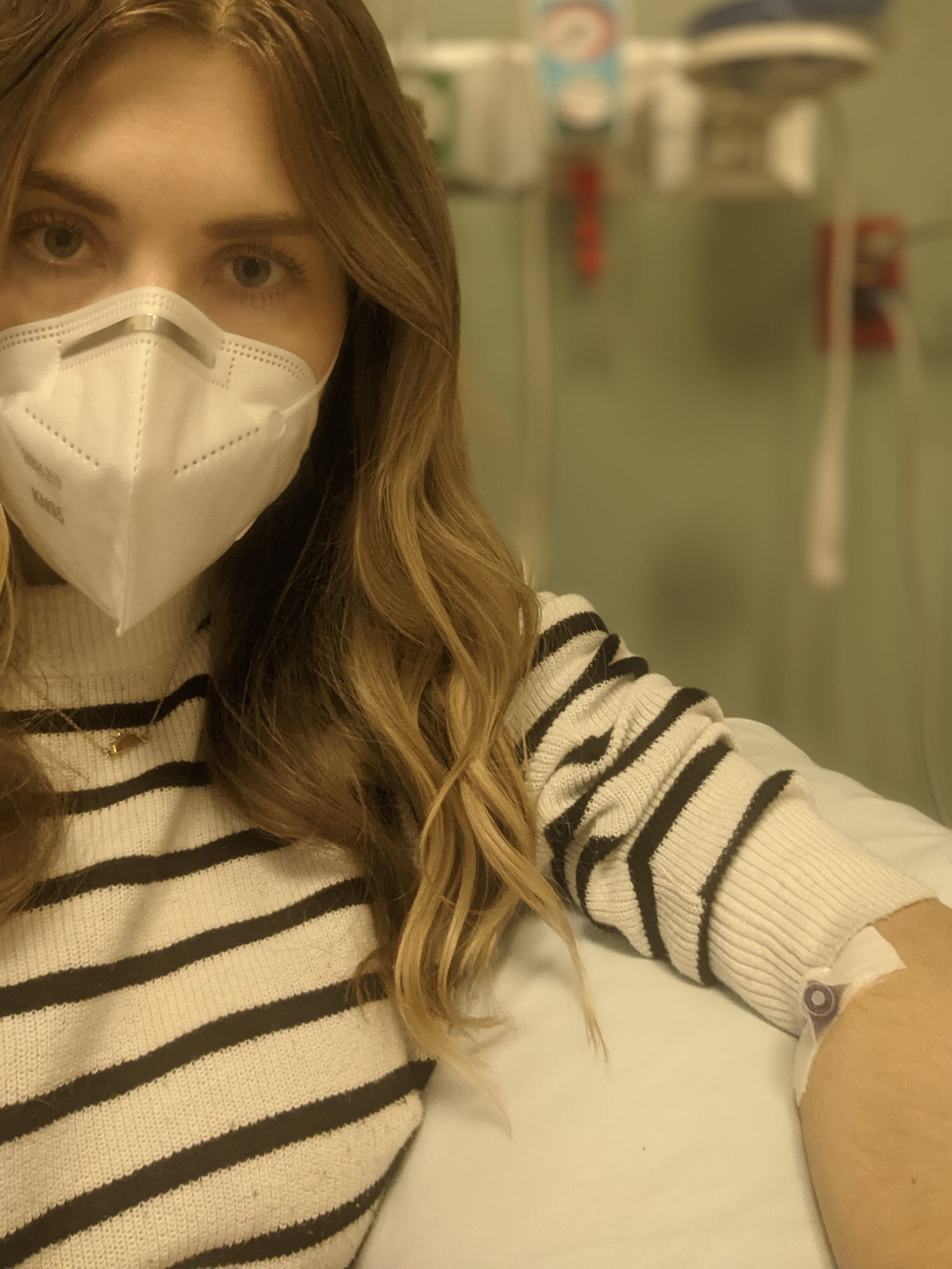 kelsey owens wearing a medical mask