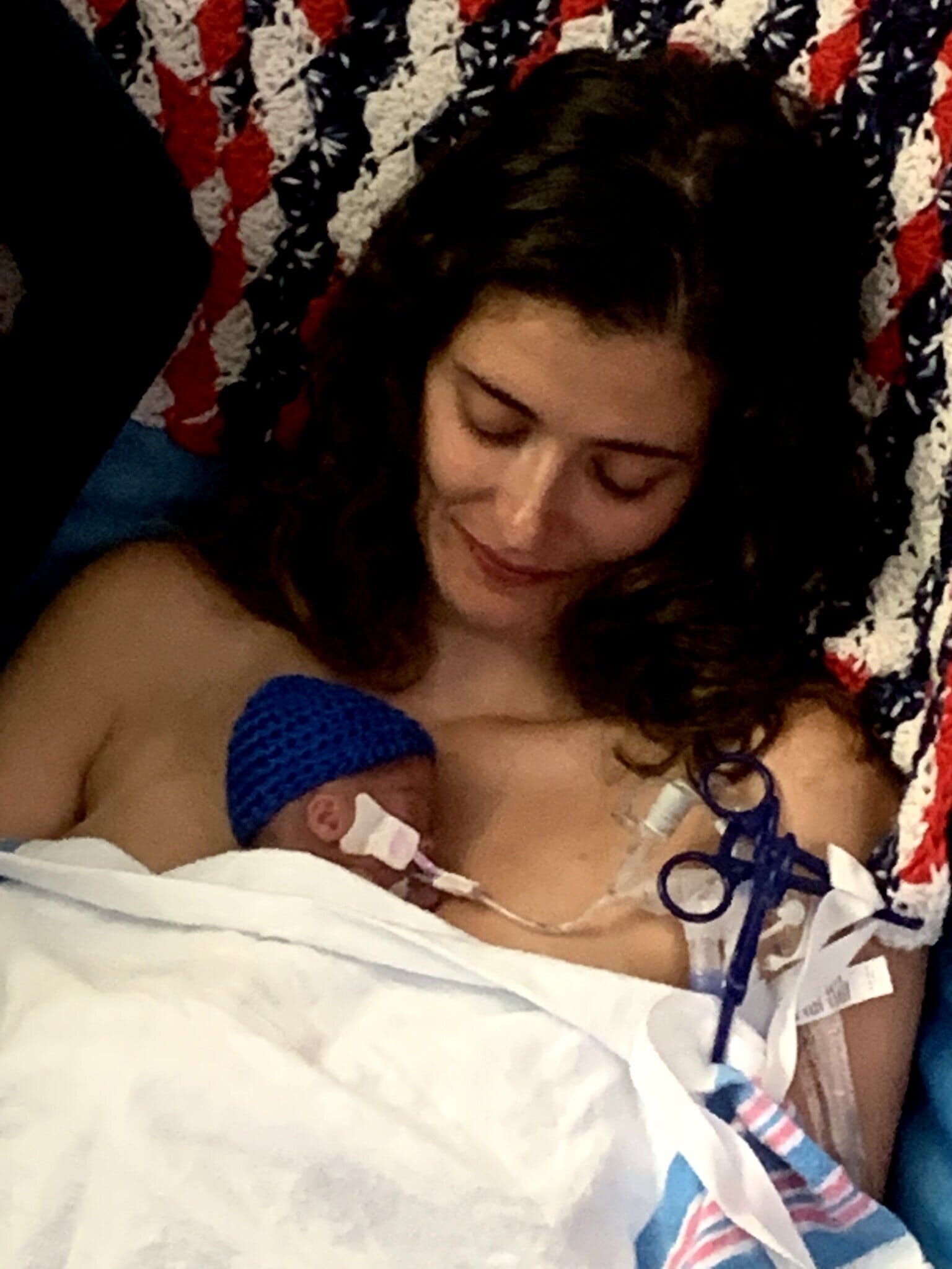 mother holding her preemie baby
