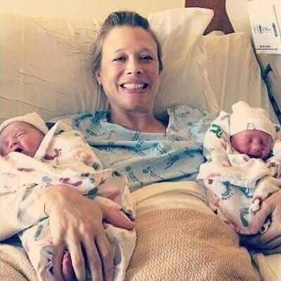 three-time surrogate tiffany jo baker holding the twins she carried