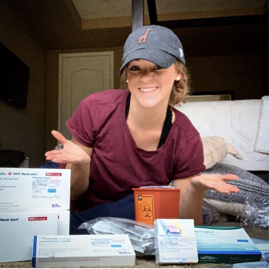 nurse and infertility warrior emily attenhofer with her collection of ivf meds