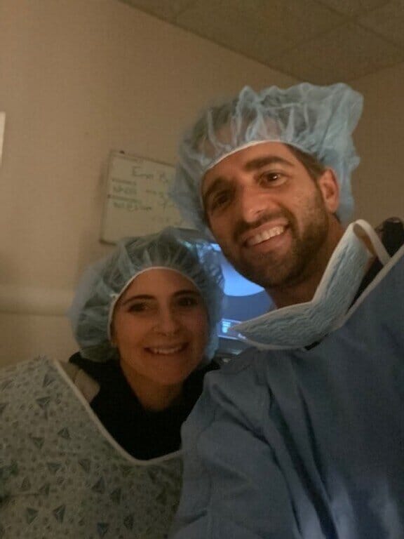 fertility blogger erin bulcao and husband at their ultrasound appointment