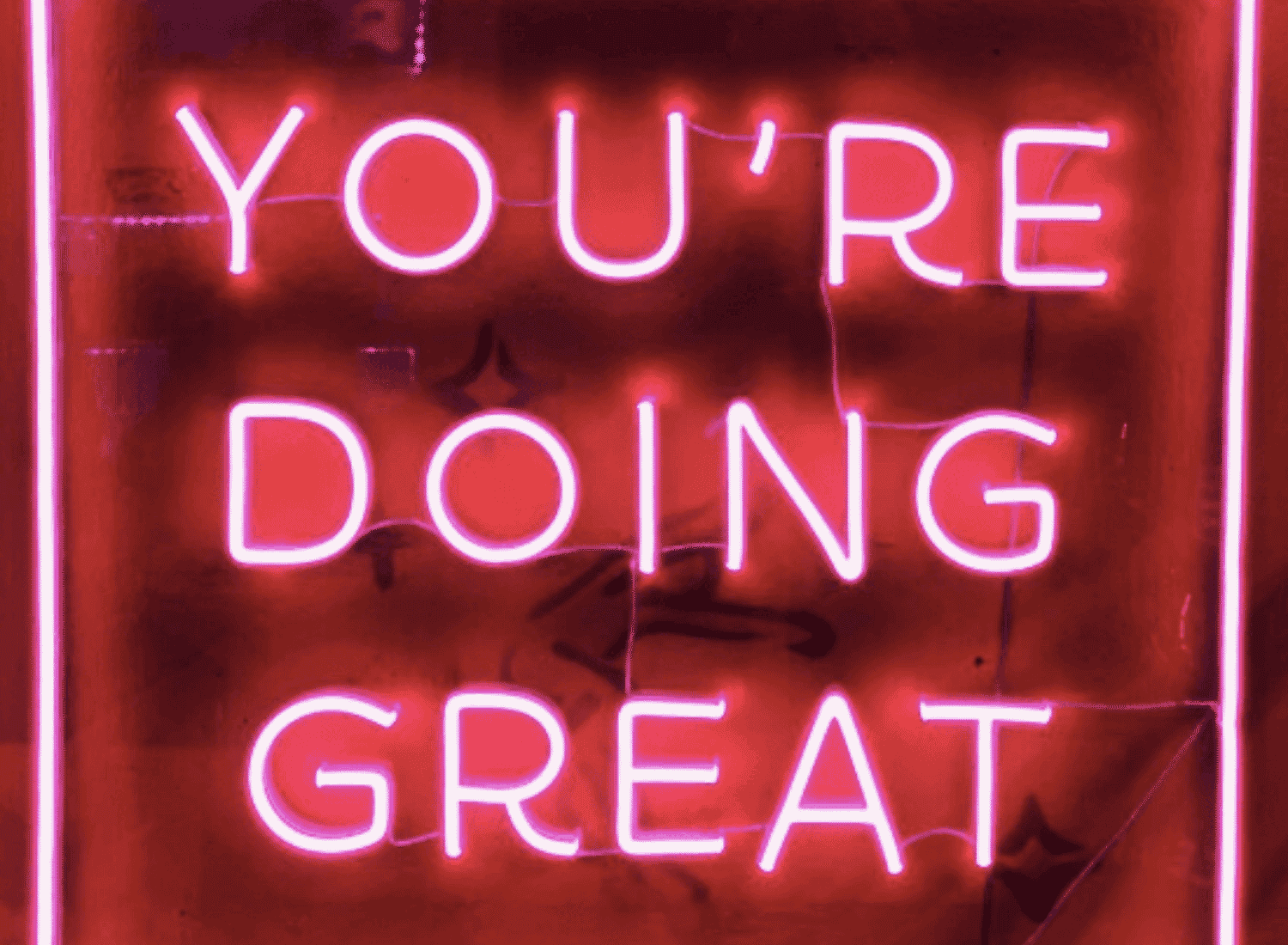 neon sign that reads you're doing great